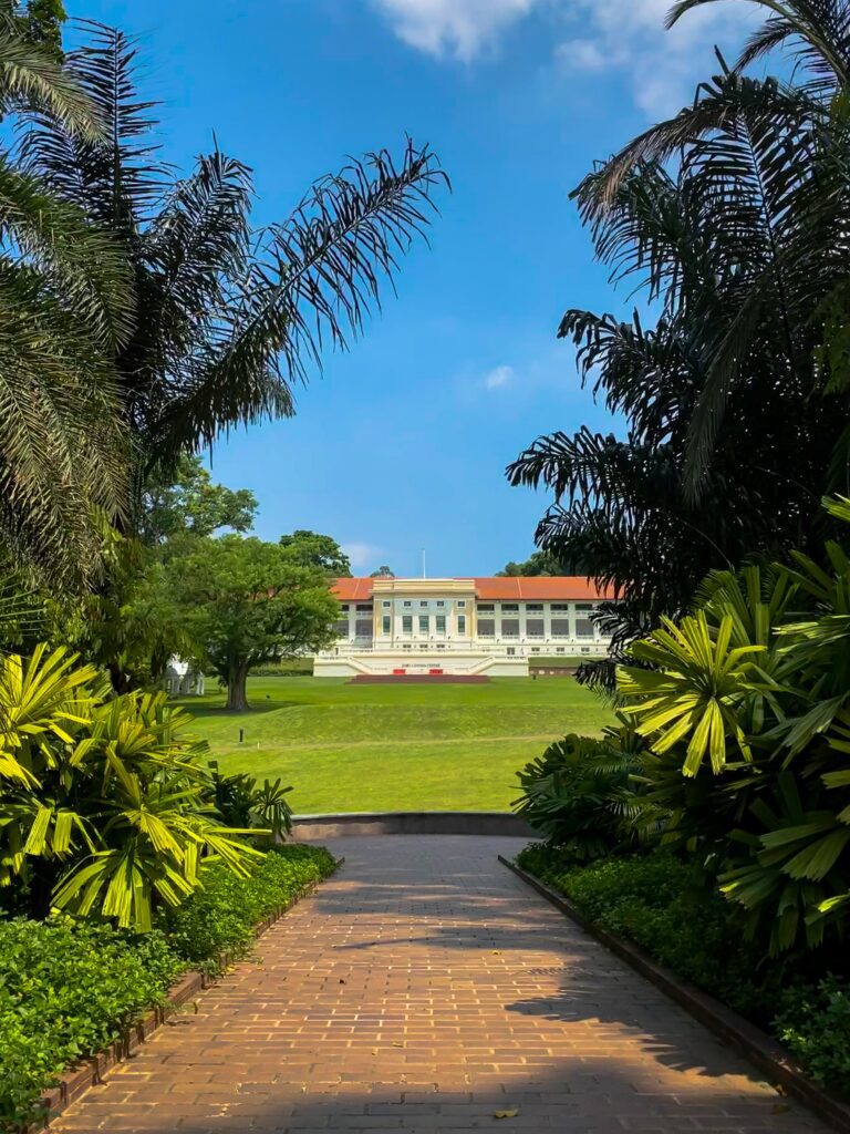 A building framed by trees in Fort Canning Park