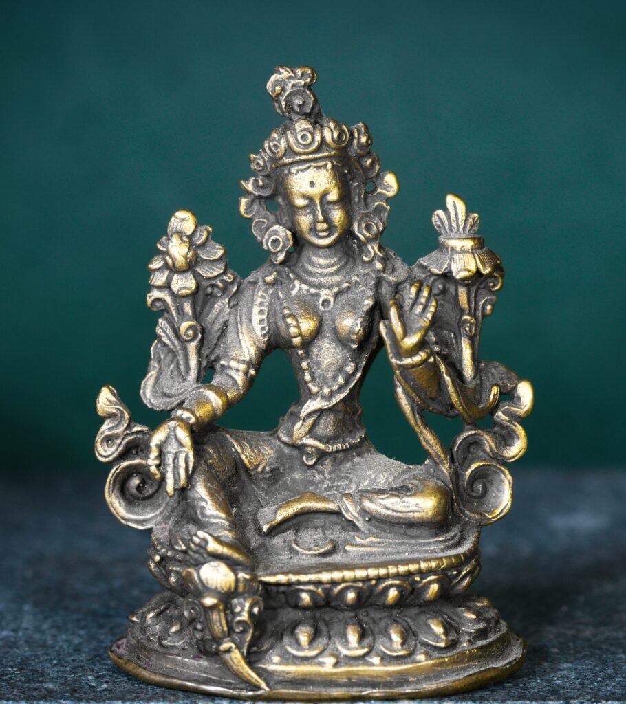 Green Tara with her right leg extended, symbolizing that she is ready to leap to the aid of any being
