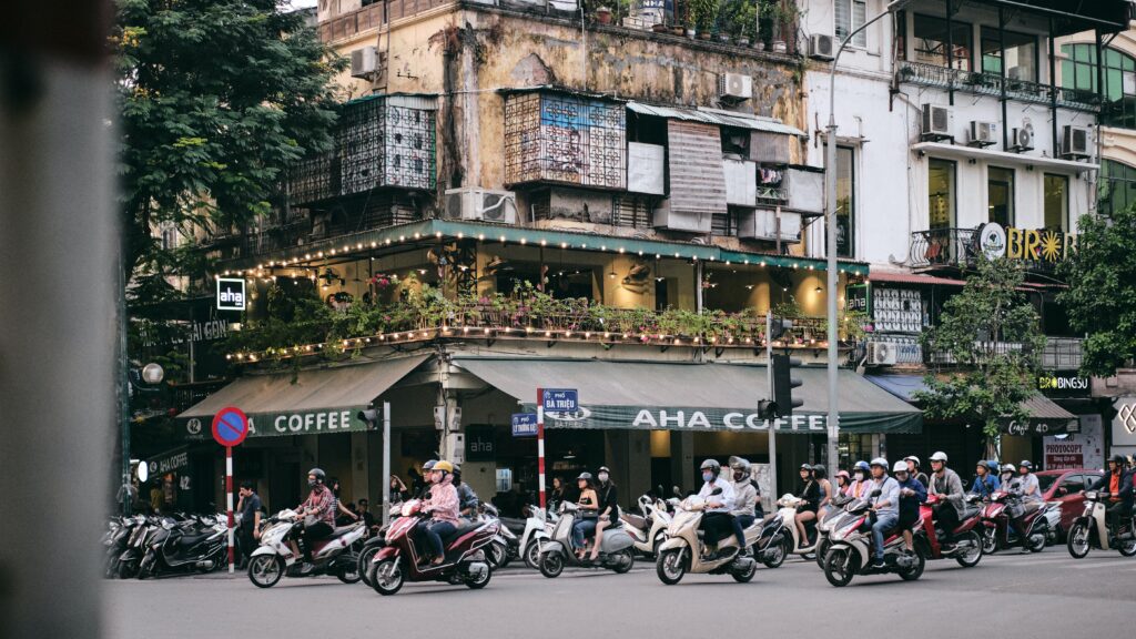 Motorbikes cruising in the streets of Hanoi's Old Quarter