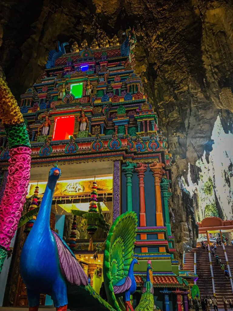 Colorful Hindu temples inside Batu Caves