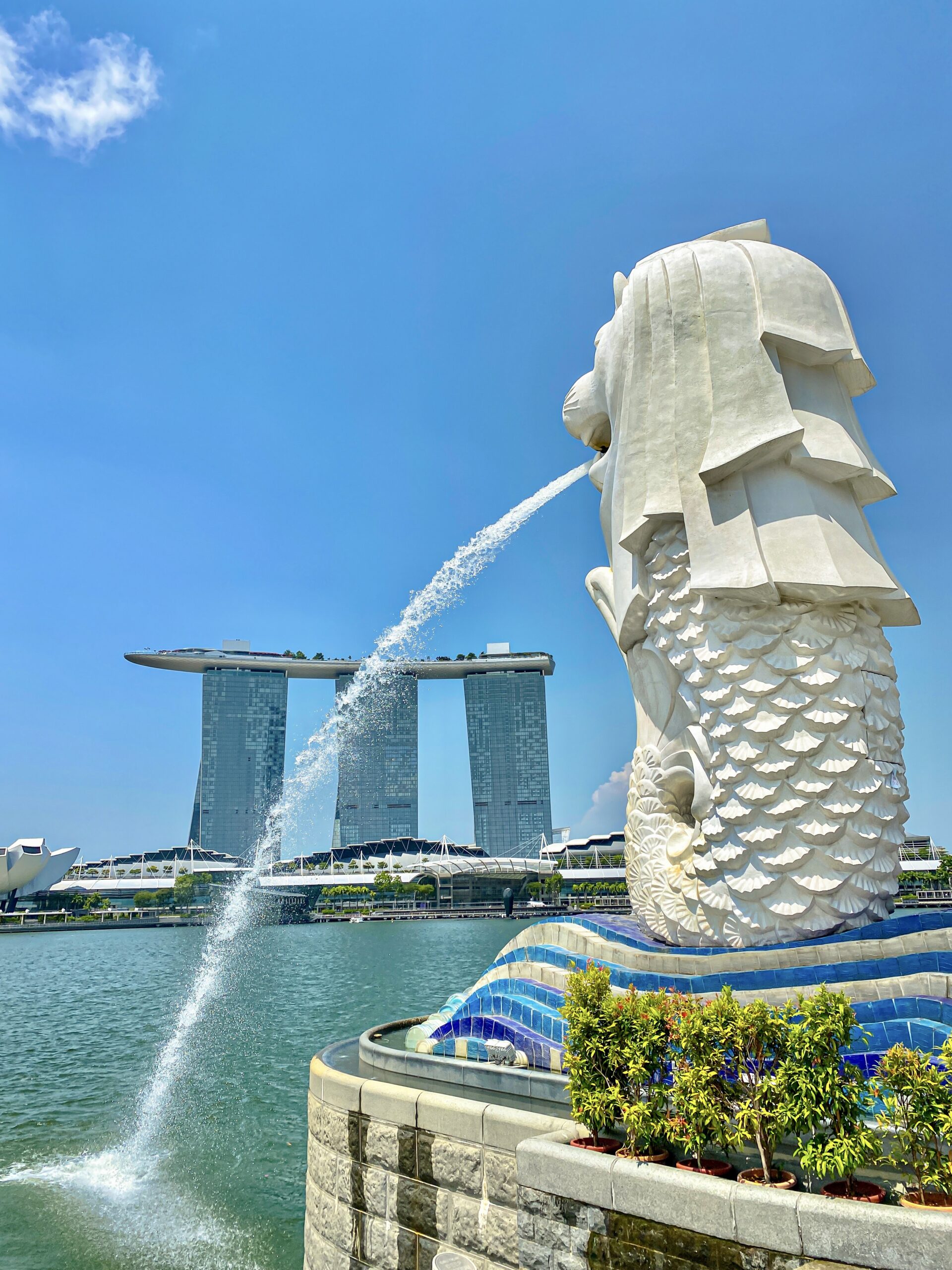 The iconic Merlion statue with Marina Bay Sands in the background. Singapore City