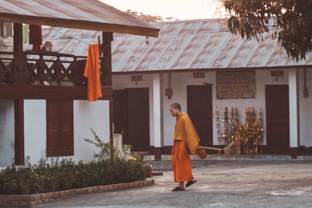 A young monk in the iconic saffron robes, Luang Prabang