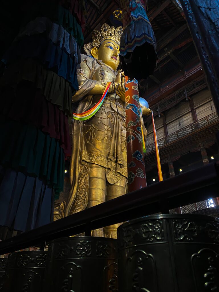 Bodhisattva Avalokiteshvara statue inside the Gandantegchinlen Monastery of Mongolia. The Heart Sutra Mantra and Om Mani Padme Hum mantra are associated with him.