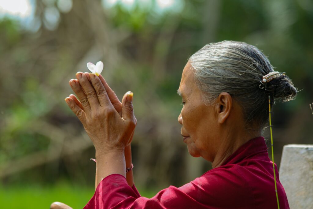 Woman praying Bali spirituality