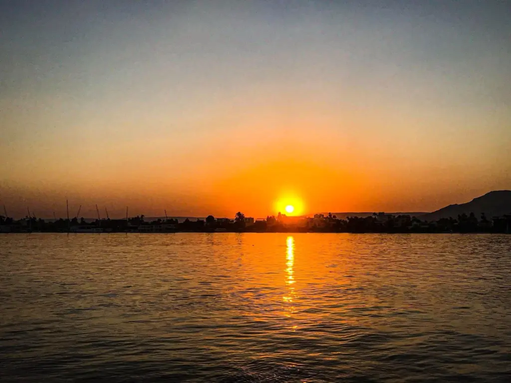 Sunset by the Nile River